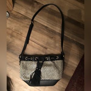 Cream and black tassel purse